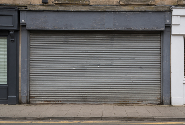 Serviceable roller shutter with a worn finish in Flitwick