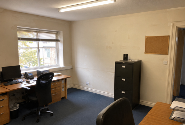 Tired commercial office before repainting in Milton Keynes