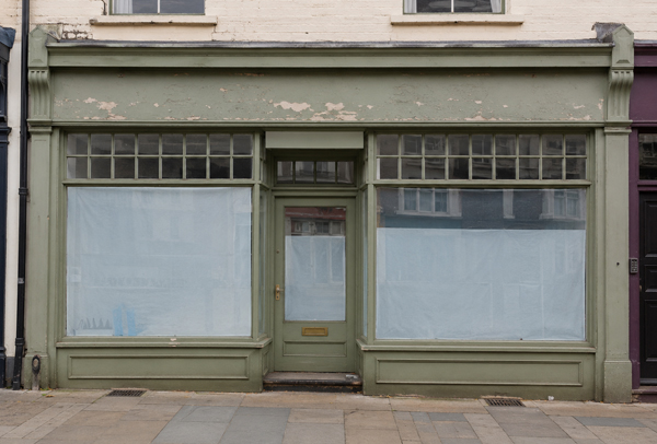Existing shop front before refurbishment in Flitwick