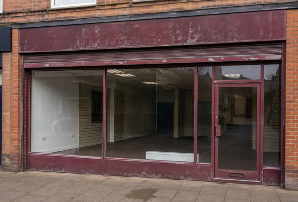 Aluminium commercial entrance before recoating in Sandy