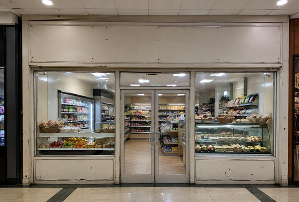 Commercial frontage before a painted makeover in Sandy