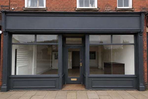 Commercial shop front after professional painting and spraying in Milton Keynes