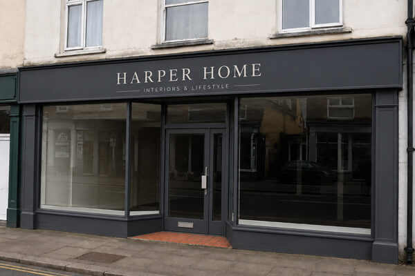 Updated shop frontage after professional spray painting in Letchworth Garden City