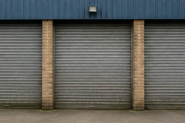 Factory roller shutter door before painting in Flitwick