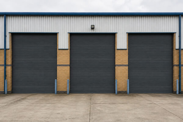 Multiple roller shutter doors after painting in Flitwick