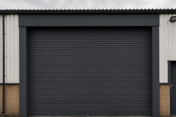 Commercial roller shutter door after professional painting in Flitwick